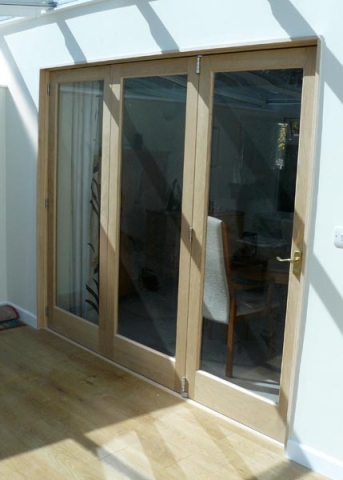 Timber folding doors.