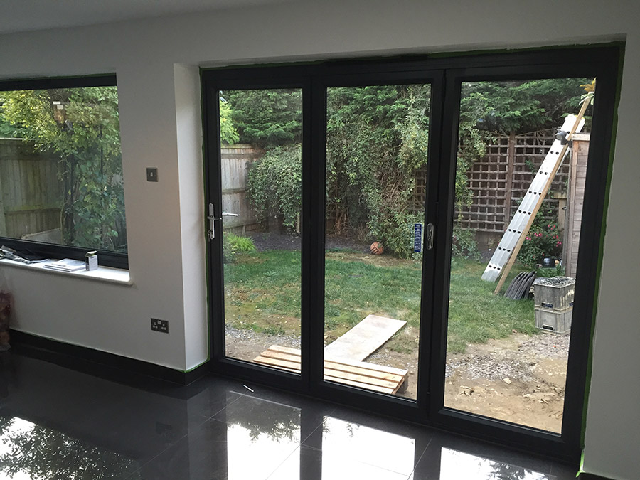 Anthracite grey aluminium bi-folding doors, 3 section.