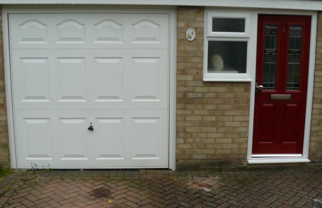 Cathedral garage and front door.