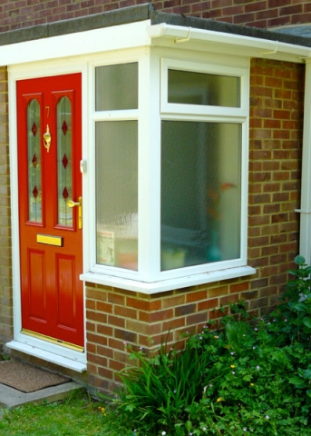 Enclosed porch and brickwork.