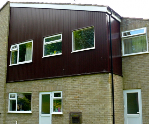 Rosewood ship-lap cladding.