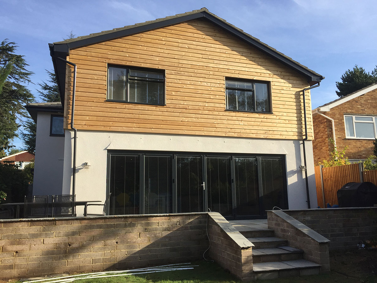 Anthracite grey bi-folding doors, 6 sections and windows.